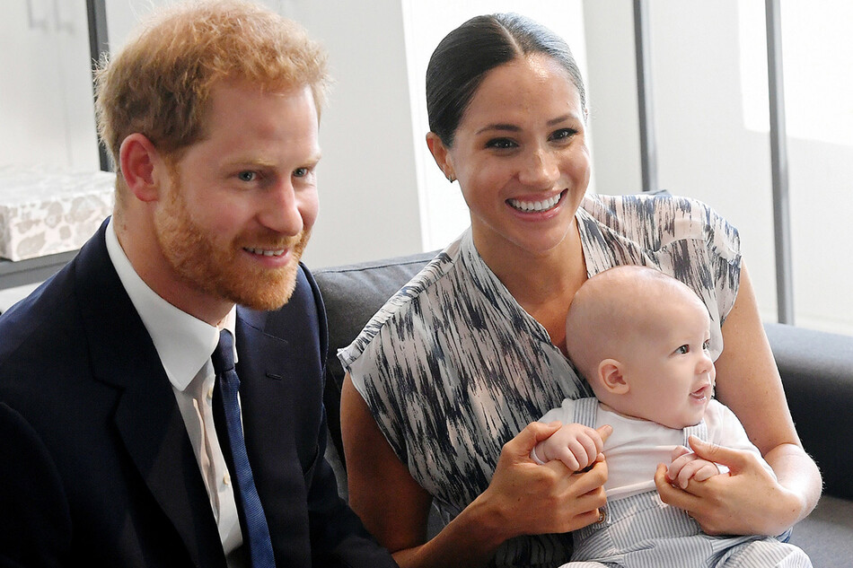 Принц Гарри и Меган Маркл с сыном Арчи Маунтбеттен-Виндзором, в Кейптауне 2019 года.