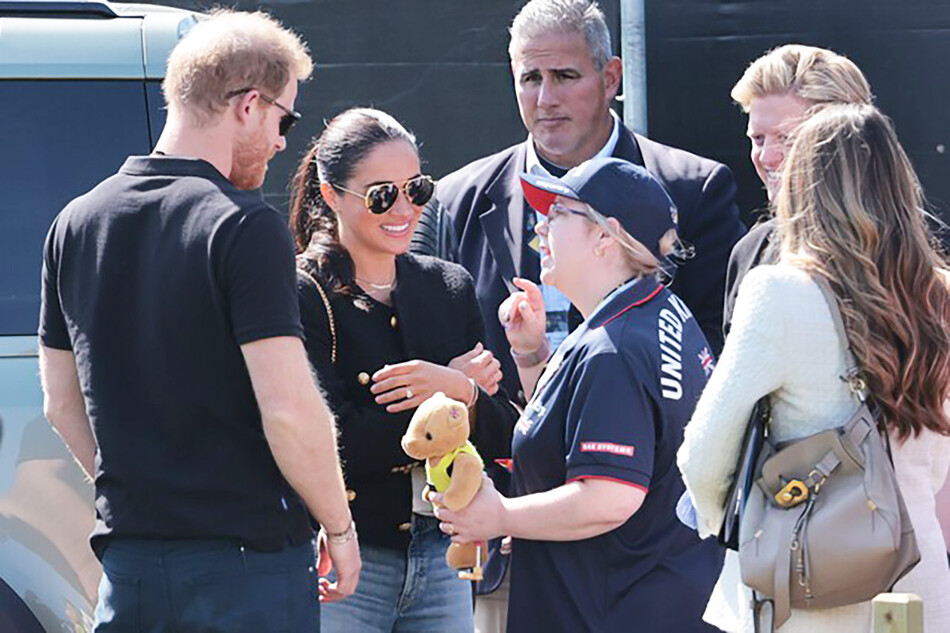 Кристофер Санчес охраняет принца Гарри и Меган Маркл во второй день проведения Invictus Games 2020 в Гааге, 2022