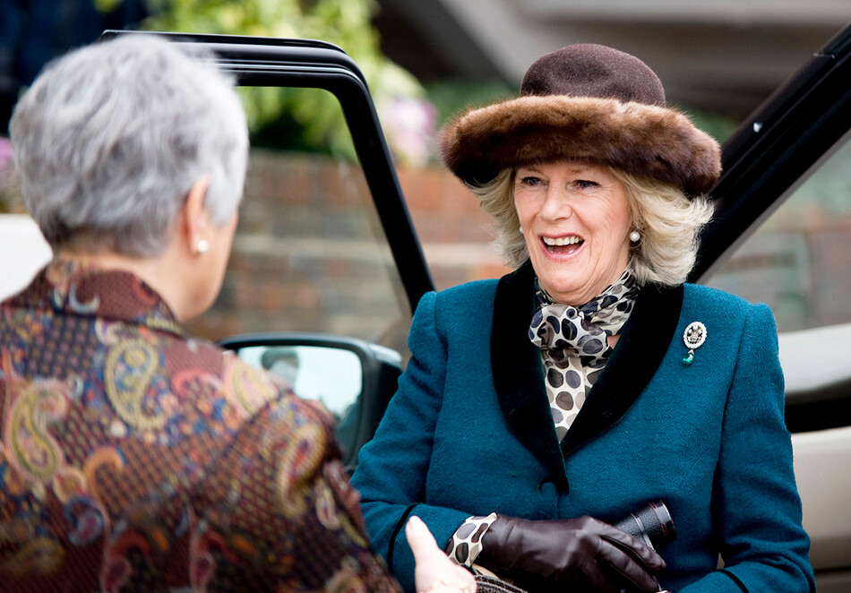 Герцогиня Корнуольская, прибывает на второй день Челтнемского фестиваля скачек 14 марта 2012 года в Челтнеме, Англия