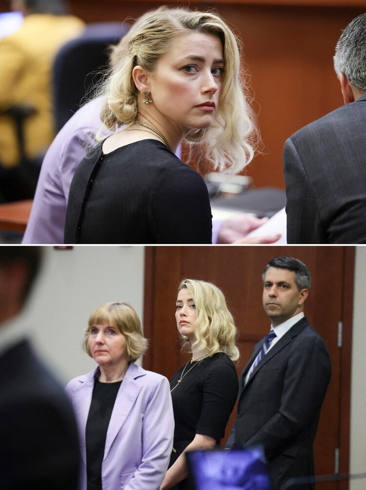 Эмбер Херд с адвокатами Элейн Бредехоф (слева)и Беном Роттенбортом (справа) слушает вердикт суда присяжных в окружном суде округа Фэрфакс в Фэрфаксе, штат Вирджиния, 1 июня 2022 года